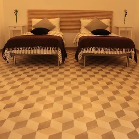 بيت ضيافة Papaya Suites